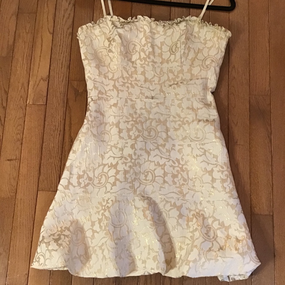 White and gold mini dress